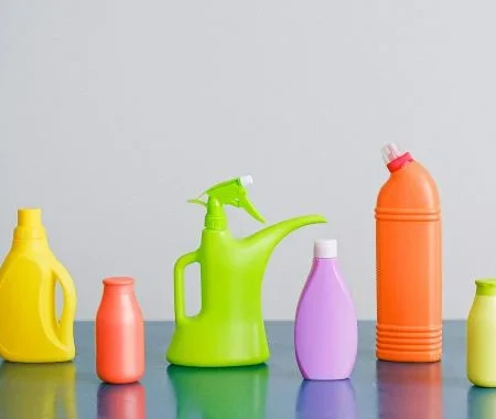 Colorful array of cleaning product bottles